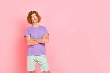 Poster - Portrait of attractive hesitant unsure guy folded arms overthinking copy space clue isolated over pink pastel color background