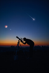 silhouette of a man and telescope under the starry skies.