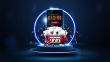 Blue Podium Floating In The Air With Blue Neon Ring, Smartphone, Red Slot Machine, Poker Chips And Playing Cards In Dark Scene