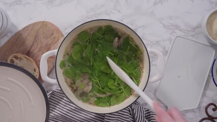 Poster - Cooking vegetarian white bean soup in cast iron dutch oven.