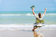 © CandyRetriever  - Caucasian businessman sitting on outdoor chair working on digital tablet for business currency stocks trading at the beach. Handsome male enjoy outdoor lifestyle work and travel on summer vacation.