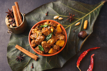 Canvas Print -  Traditional homemade Mutton curry from Asian cuisine Chukhandar gosht spicy meat beef curry served coconut shell mutton roast Indian spices. side dish Ghee rice Appam Parotta