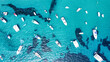 Drone shot of boats on aqua ocean