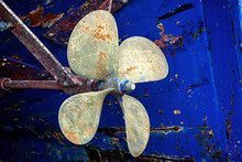Ship Rusty Propeller Of A Marine Ship, Which Stands In A Dry Dock For Repair. 