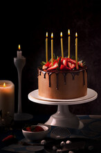 Birthday Chocolate Cake With Candles. Blow Out Candles On Top Of A Birthday Cake. Chocolate And Strawberry Cake Poster