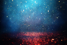Background Of Abstract Gold And Blue Glitter Lights. Defocused