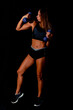 © Inception - Brutal athletic woman pumping up muscles with dumbbells. Sexy attractive fitness woman, trained female body, lifestyle portrait, caucasian model.