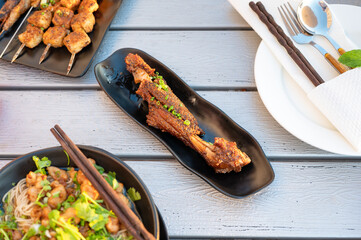 Chinese lamb barbeque served on a plate in a restaurant top view