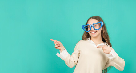 funky teen girl having fun. smiling child in party glasses. fashion accessory. going crazy.