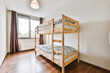 Lovely bedroom with wooden bunk bed and chandelier
