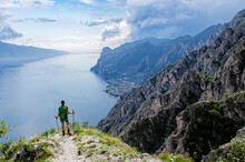 Garda Lake Hiker With Hiking Sticks Beautiful View

