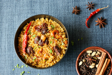 Poster - Mutton biryani Beef Biryani, Gosht or lamb biriyani Hyderabadi Dum biriyani with raita yoghurt dip special occasion Indian festival food Ramadan , Eid Hyderabad Kerala India Sri Lanka. Lankan food.