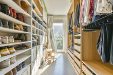Spacious Wardrobe With Shelves For Shoes And Hanger With Clothes