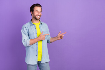 Sticker - Photo of cheerful good mood man point finger copyspace advice promotion isolated on violet color background