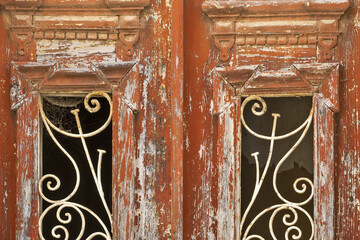 old door has decrepit paint in Portimao, Algarve, Portugal