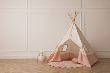 Wall Mural - Cute child room interior with play tent near white wall, space for text
