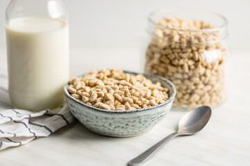 Wall Mural - Breakfast cereals. Oat pops in bowl.