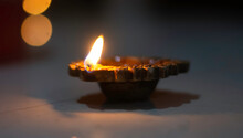 Burning Earthen Lamp In The Dark During Diwali