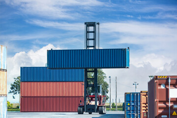 Wall Mural - Crane lifting up container in railroad yard. Crane lifting up container in yard. forklift handling container box loading.	