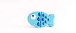 © KatrinaEra - Food toy fish on white background. Creative wooden design. Child development. Kids play.