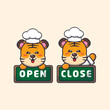 cute tiger chef mascot cartoon character with open and close board