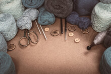 Craft Hobby With Vintage Knitting Needles, Scissors And Yarn On Wooden Ground, Still Life Photo With Soft Focus. View From Above. Handicraft Day Concept. Place For Text. Crochet Background Blue Pastel