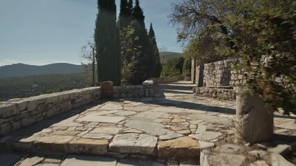 Wall Mural - Following the big stairs up an ancient greek building