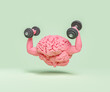 © Antonio Solano - brain with muscular arms and dumbbells in hands