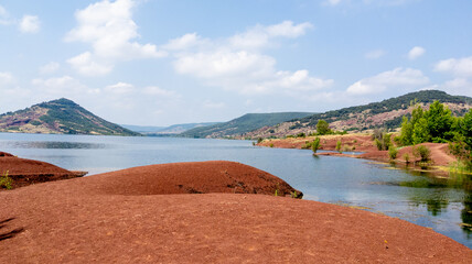 lac du salagou dusk red panoramic landscape lake coast with mountain panorama view