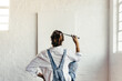 © Jacob Lund - Female painter contemplating creative ideas for her new art project