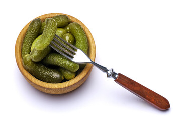 Wall Mural - Bowl of Tasty canned Whole green cornichons isolated on a white background