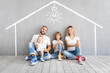 © Sunny studio - Happy family with two kids playing into new home