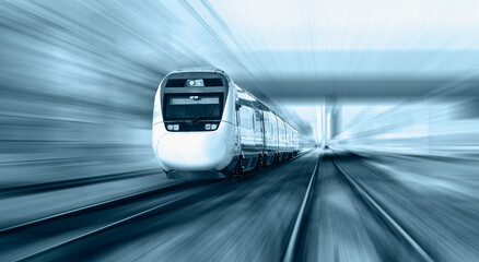 Wall Mural - White high speed train runs on rail tracks -Train in motion