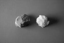 Rock And Crumpled Paper Ball