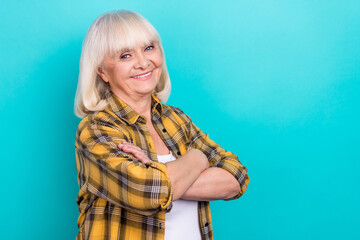 Sticker - Profile side photo of cheerful aged woman crossed hands smart isolated over turquoise color background