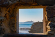 Cape of trafalgar seen from a window in Caños de Meca, south Spain