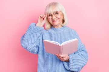 Poster - Photo of lovely granny read book fairytale her grandchild eyewear isolated over pink color background