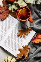 Canvas Print - Book, cup of tea and autumn decor on light background