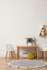 Wall Mural - Cute child room interior with furniture, toys and wigwam shaped shelf on white wall