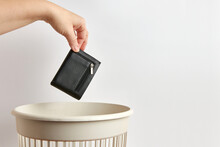 The Wallet Is Thrown Away In A Landfill For Disposal And Recycling