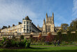 Parade park and Bath Abbey in the background against a blue sky
