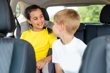 Cute Children In Car, Boy And Girl In The Car.