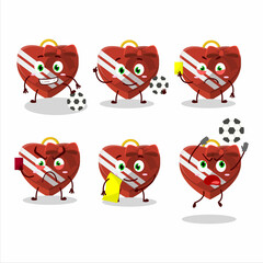 Canvas Print - Red love gift box cartoon character working as a Football referee