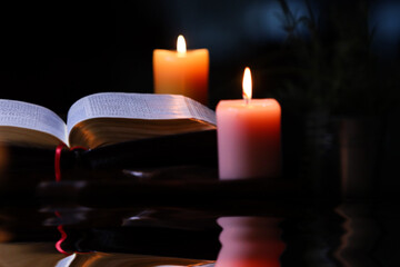 Wall Mural - The soft candle and the Bible are comfortable and stable, making them good for prayer and meditation videos, creating a holy and sacred atmosphere.
