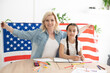 © Angelov - Mother and daughter with American Flag.