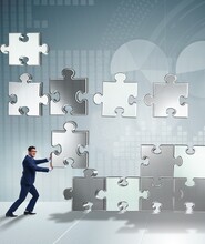 Business Concept Of Teamwork With Puzzle Pieces
