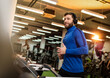 © bugarskipavle3 - Young man in sportswear running on treadmill at gym