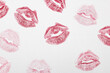 © Dunja - Red lipstick marks on a white background. Kiss symbol. Minimal love concept.Flat lay.