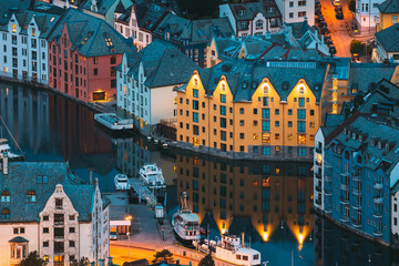 Alesund, Norway. Night View Of Alesund Skyline Cityscape. Historical Center In Summer Evening. Famous Norwegian Landmarks And Popular Destination. Alesund, Norway. Night View Of Alesund Skyline