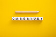 © chee siong teh - Case Study word with pencil on yellow background